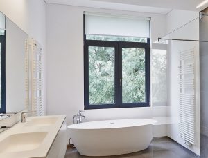 black replacement windows in a bathroom